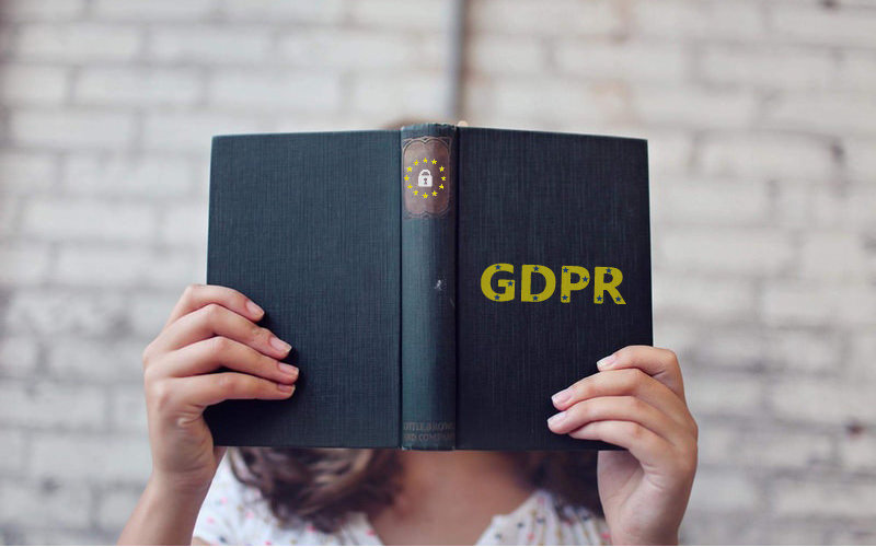 woman reading gdpr book